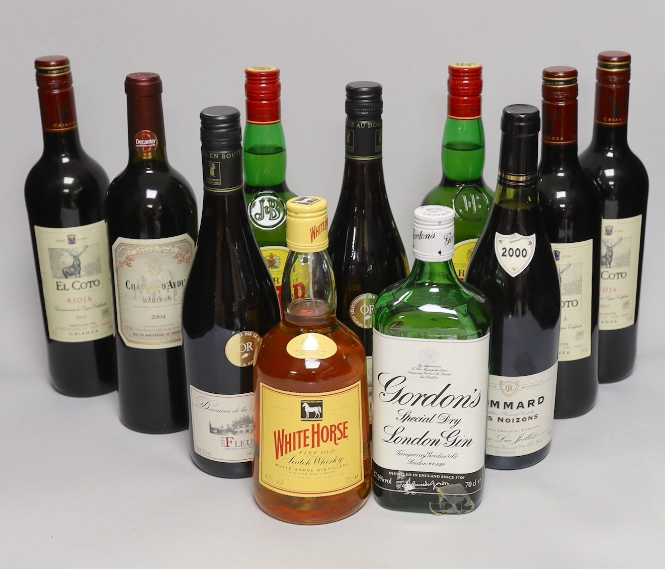 A quantity wine and spirits including Fleurie, Pommard, El Coto Rioja, Chateau D’Aydie, Gordons, J&B and White Horse